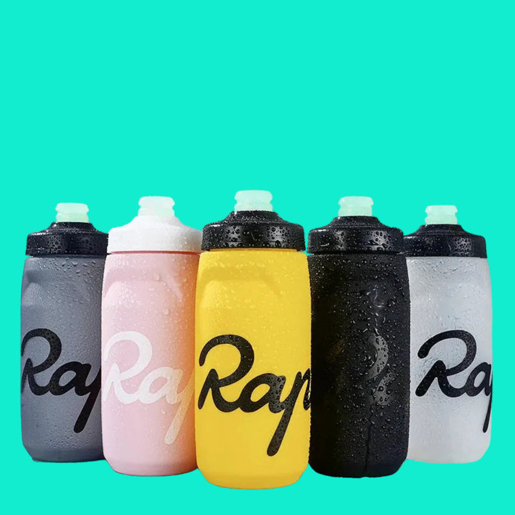 Set of Rapha water bottles in various colors on a light blue background

